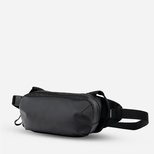 wandrd-d1-fanny-pack-bauchtasche-schwarz-crossbody image 1