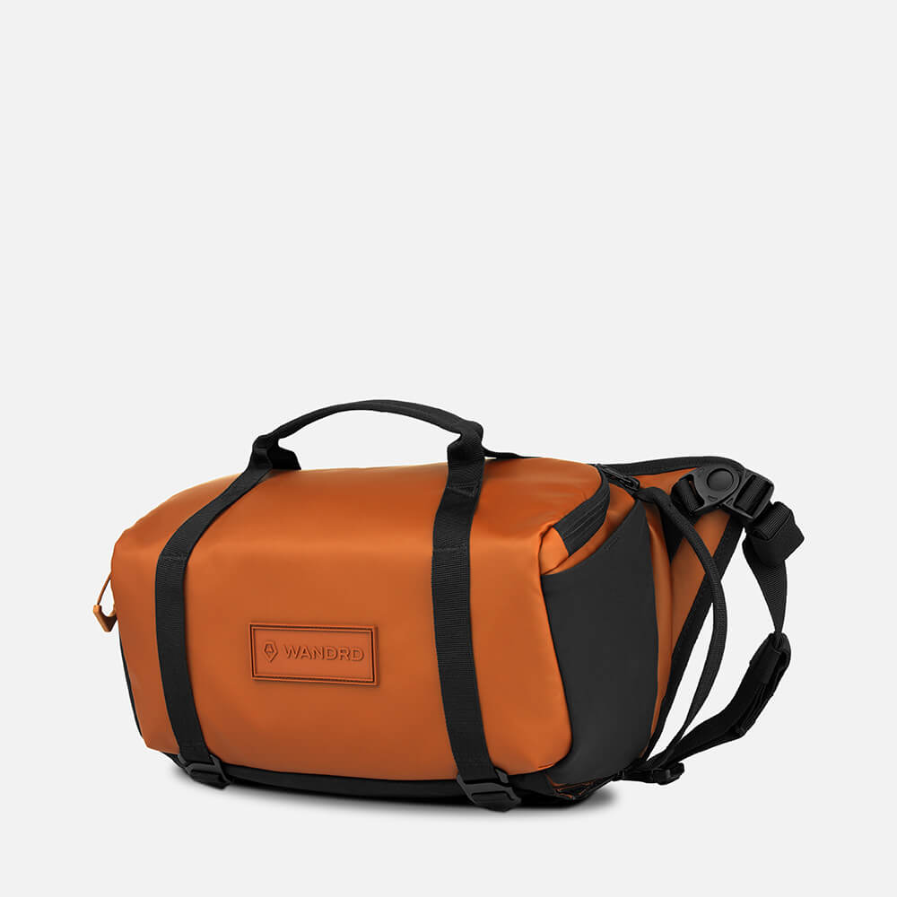 wandrd-rogue-9l-sling-sedona-orange-wetterfest-mit-laptopfach image 2
